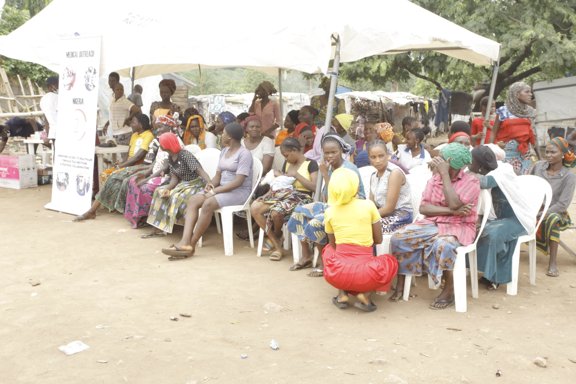 Health worker using a tablet in the field