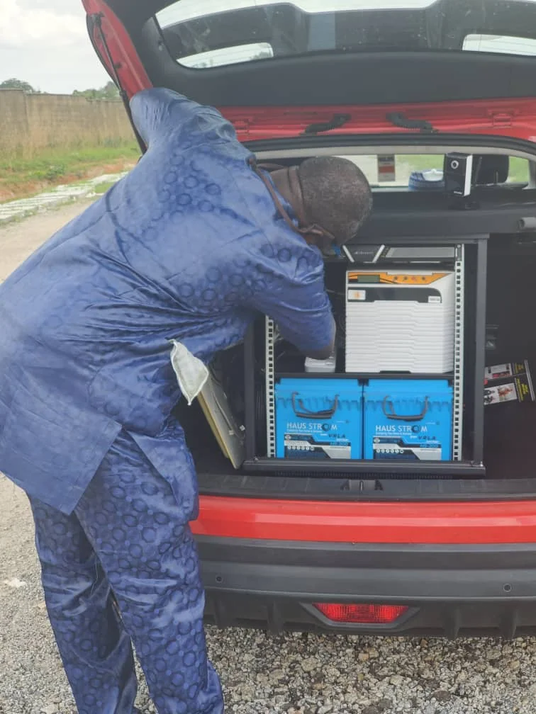 Health worker using a tablet computer in a field clinic